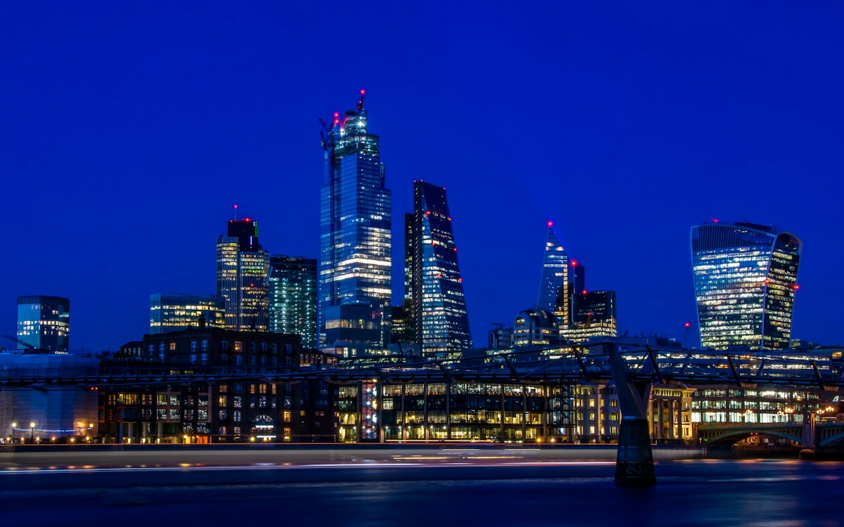 London skyline illuminated at blue hour